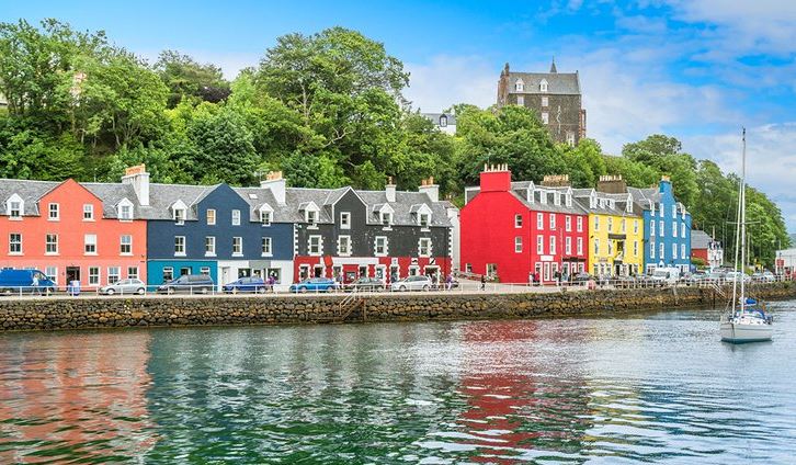 a picture of a scottish village taken on a beautiful day manipulated on photoshop